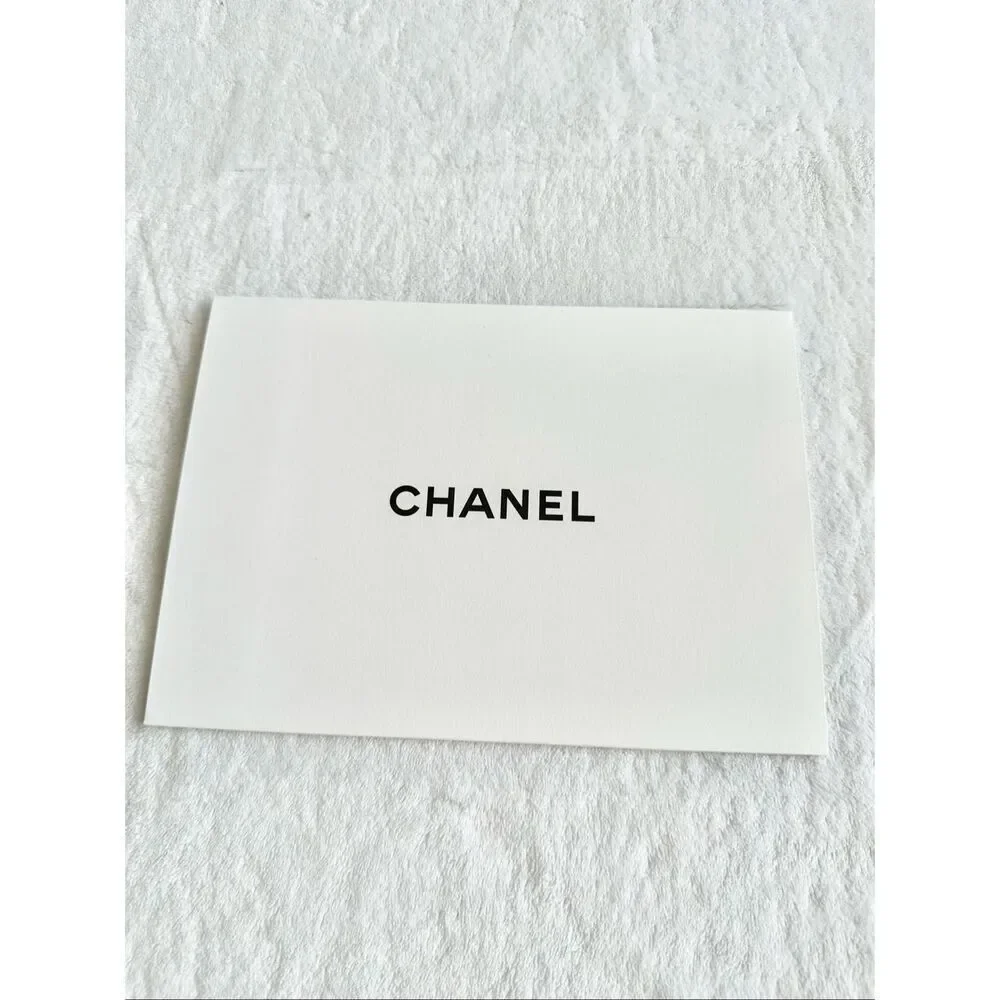 Chanel black-and-white sleeve cover